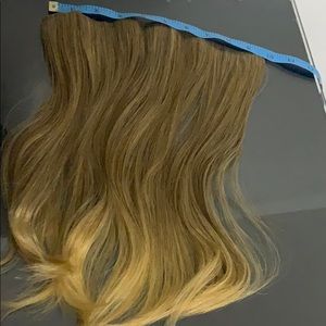 Woman’s Blond Hair Extension.